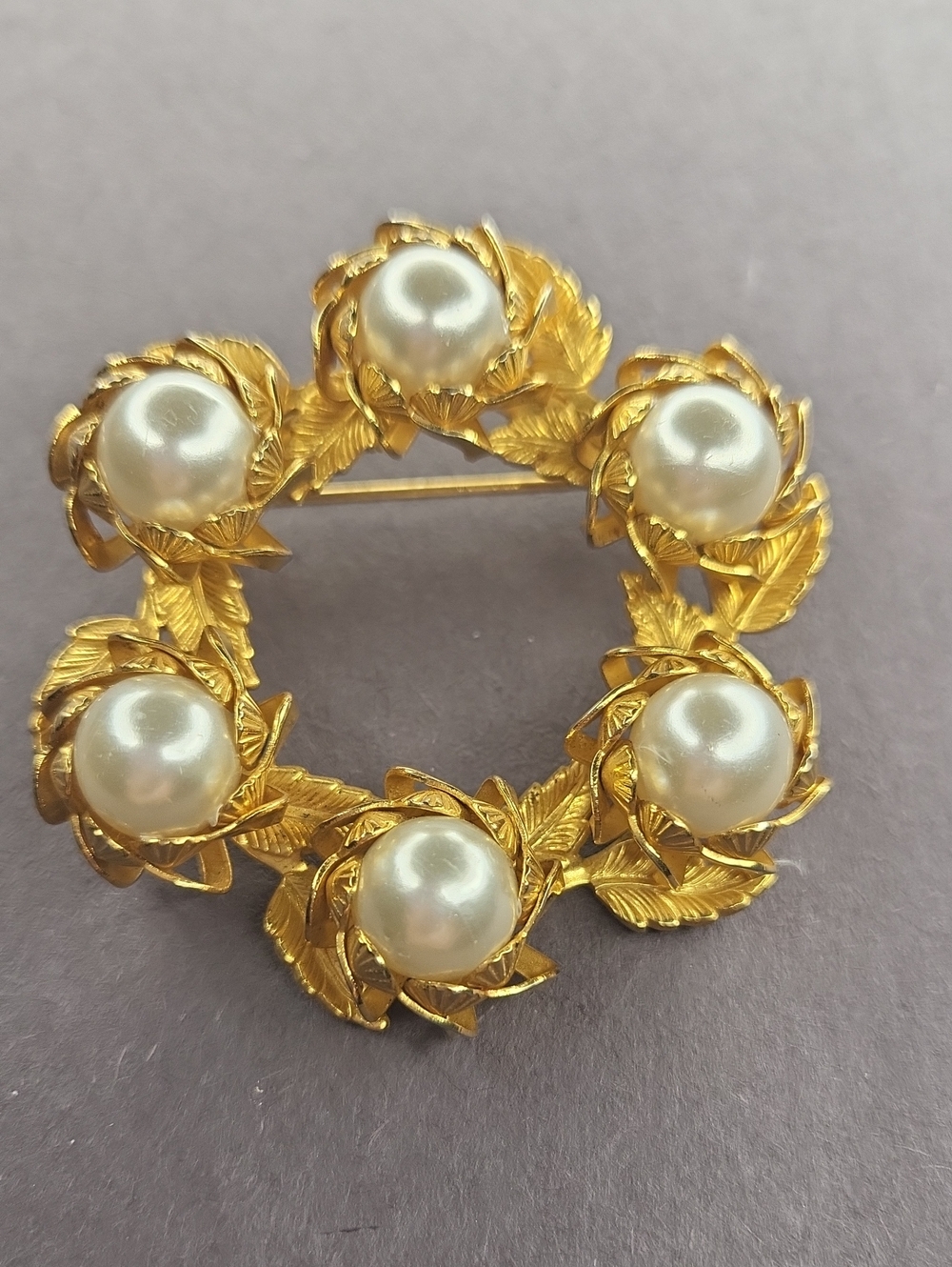 Elegant Gold and Pearl Brooch